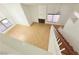 A living room with tile flooring, staircase and fireplace at 5040 Jacarilla Ln, North Las Vegas, NV 89031