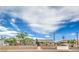 Charming home with mature trees, a fenced front yard and long driveway at 5203 Treasure Ave, Las Vegas, NV 89122