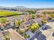 Aerial view of neighborhood showcasing well-maintained homes, landscaping, and mountain backdrop at 5232 Pendergrass St, North Las Vegas, NV 89081