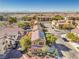 High angle view of a residential neighborhood with well-maintained lawns and beautiful landscaping at 5232 Pendergrass St, North Las Vegas, NV 89081