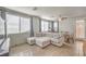 Spacious living area showcasing a dining area and comfortable sofa, perfect for entertaining at 5232 Pendergrass St, North Las Vegas, NV 89081