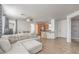 Open-concept living space with seamless flow to the kitchen and access to the outdoor patio at 5232 Pendergrass St, North Las Vegas, NV 89081