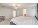 Serene main bedroom with neutral decor and a papasan chair, offering a relaxing retreat at 5232 Pendergrass St, North Las Vegas, NV 89081