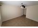 Neutral bedroom featuring tile flooring, ceiling fan, and closet at 5710 E Tropicana Ave # 1172, Las Vegas, NV 89122