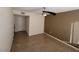 A bright bedroom with tile flooring, ceiling fan, and a two-toned paint scheme at 5710 E Tropicana Ave # 1172, Las Vegas, NV 89122
