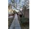 Sidewalk and lovely landscaping lead to this community's well-maintained buildings at 5710 E Tropicana Ave # 1172, Las Vegas, NV 89122