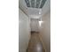 Hallway with tile floors and access to closets and other rooms at 5710 E Tropicana Ave # 1172, Las Vegas, NV 89122
