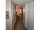 Hallway view leading to the front door with tile flooring at 5710 E Tropicana Ave # 1172, Las Vegas, NV 89122