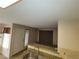 Kitchen with breakfast bar featuring granite countertops and stainless steel sink at 5710 E Tropicana Ave # 1172, Las Vegas, NV 89122