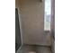 Enclosed patio area with neutral walls and a sliding glass door and window at 5710 E Tropicana Ave # 1172, Las Vegas, NV 89122