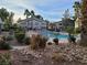 Enjoy the pool area featuring lush landscaping and inviting community gathering spaces at 5710 E Tropicana Ave # 1172, Las Vegas, NV 89122