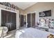 Spacious bedroom with stylish vanity and connecting bathroom at 5855 Boulder Brook Ct, Las Vegas, NV 89149