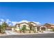 Stunning single story home with a well manicured xeriscaped yard and a three car garage at 5855 Boulder Brook Ct, Las Vegas, NV 89149