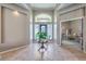 Inviting foyer boasts tile flooring, high ceilings, and a view into adjacent rooms at 5855 Boulder Brook Ct, Las Vegas, NV 89149