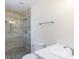 Remodeled bathroom featuring a stone shower and a crisp white vanity at 6320 Shawnee Ave, Las Vegas, NV 89107