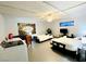 Spacious bedroom with two beds, laundry area and a view of Las Vegas at 6320 Shawnee Ave, Las Vegas, NV 89107