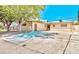 Charming single-story home with mature trees and a spacious driveway at 6320 Shawnee Ave, Las Vegas, NV 89107