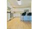 Bright kitchen with white cabinetry, stainless steel appliances, and breakfast bar at 6320 Shawnee Ave, Las Vegas, NV 89107