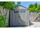 Durable outdoor storage shed with double doors, offers secure storage for gardening equipment and outdoor essentials at 6320 Shawnee Ave, Las Vegas, NV 89107