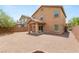 Spacious backyard featuring low-maintenance gravel landscaping, covered patio, and potential for outdoor enjoyment at 6480 Chebec St, North Las Vegas, NV 89084