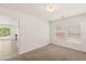 Bedroom with carpet and views into the backyard at 6480 Chebec St, North Las Vegas, NV 89084