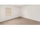 Bright bedroom with a large window and neutral walls at 6480 Chebec St, North Las Vegas, NV 89084