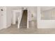 Inviting entryway with tile flooring and a staircase leading to the upper level at 6480 Chebec St, North Las Vegas, NV 89084