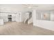 Open-concept floor plan with stainless steel appliances and wood-look flooring at 6480 Chebec St, North Las Vegas, NV 89084