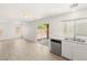Open floor plan featuring a living room with sliding door access to the backyard patio at 6480 Chebec St, North Las Vegas, NV 89084