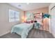 Charming bedroom featuring soft tones, bright natural light and stylish decor at 6529 Cinnamon Hazelnut Ave # Lot 93, North Las Vegas, NV 89084