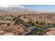 Aerial community view with desert landscape at 7029 Bocaire Dr, Las Vegas, NV 89131