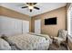 Cozy bedroom with white trim and a ceiling fan at 7029 Bocaire Dr, Las Vegas, NV 89131