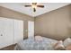 Neutral bedroom featuring a ceiling fan and carpet at 7029 Bocaire Dr, Las Vegas, NV 89131
