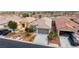 Well-maintained single-story home with desert landscaping, street view at 7029 Bocaire Dr, Las Vegas, NV 89131