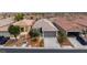 Charming single-story home featuring a well-maintained yard and two-car garage at 7029 Bocaire Dr, Las Vegas, NV 89131