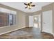 Bedroom featuring light brown walls and wood-look flooring at 7813 Riviera Beach Dr, Las Vegas, NV 89128