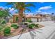 Beautiful desert home featuring a three-car garage and well-maintained landscaping at 7813 Riviera Beach Dr, Las Vegas, NV 89128