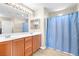 Functional bathroom with double sinks, plenty of countertop space, and a shower at 7868 Territorial St, Las Vegas, NV 89149