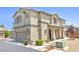 Inviting two-story home featuring low-maintenance landscaping and a two-car garage at 7868 Territorial St, Las Vegas, NV 89149