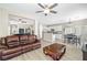 Spacious living room with an open floor plan, connecting to the kitchen and dining area at 7868 Territorial St, Las Vegas, NV 89149