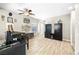 Spacious living area with ceiling fan, modern flooring and unique decorations at 7868 Territorial St, Las Vegas, NV 89149