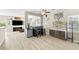 Open-concept living area featuring a bar, seating, and lots of natural light at 7868 Territorial St, Las Vegas, NV 89149