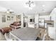 Open concept living room featuring a kitchen, dining area, and a sofa at 7868 Territorial St, Las Vegas, NV 89149