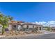 Beautiful single-story home boasting a three-car garage, desert landscaping, and tile roof at 9 Rue Grimaldi Way, Henderson, NV 89011