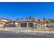 Beautiful single-story home boasting a three-car garage, desert landscaping, and tile roof at 9 Rue Grimaldi Way, Henderson, NV 89011
