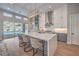 Spacious kitchen with center island and counter seating at 9 Rue Grimaldi Way, Henderson, NV 89011