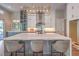 Spacious kitchen with center island and seating at 9 Rue Grimaldi Way, Henderson, NV 89011