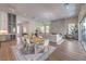 Bright and open living space with modern fireplace and ample seating at 9 Rue Grimaldi Way, Henderson, NV 89011