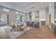 Open-concept living space with island seating and stainless steel appliances at 9 Rue Grimaldi Way, Henderson, NV 89011