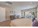 Inviting main bedroom with stylish decor and view of the landscaped backyard at 9 Rue Grimaldi Way, Henderson, NV 89011